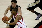 MADISON, WI - JANUARY 27: Jordan Taylor #11 of the Wisconsin Badgers looks to pass as Chris Kramer #3 of the Purdue Boilermakers defends on January 27, 2009 at the Kohl Center in Madison, Wisconsin. Purdue defeated Wisconsin 64-63. (Photo by Jonathan Daniel/Getty Images)