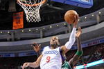 PHILADELPHIA - NOVEMBER 03:  Andre Iguodala #9 of the Philadelphia 76ers dunks against the Boston Celtics at the Wachovia Center on November 3, 2009 in Philadelphia, Pennsylvania.  NOTE TO USER: User expressly acknowledges and agrees that, by downloading and or using this photograph, User is consenting to the terms and conditions of the Getty Images License Agreement.  (Photo by Chris Chambers/Getty Images)