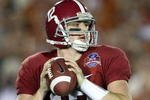 PASADENA, CA - JANUARY 07:  Quarterback Greg McElroy #12 of the Alabama Crimson Tide throws the ball against the Texas Longhorns in the second half of the Citi BCS National Championship game at the Rose Bowl on January 7, 2010 in Pasadena, California.  (Photo by Stephen Dunn/Getty Images)