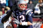 FOXBORO, MA - JANUARY 10:  Tom Brady #12 of the New England Patriots looks to pass against pressure from Terrell Suggs #55 of the Baltimore Ravens during the 2010 AFC wild-card playoff game at Gillette Stadium on January 10, 2010 in Foxboro, Massachusetts. The Ravens won 33-14.  (Photo by Jim Rogash/Getty Images)