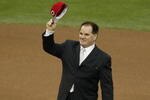 SAN FRANCISCO - OCTOBER 23:  Pete Rose acknowledges the crowd after he was voted number six in the MLB Ten Most Memorable Moments ceremony before the start of game four of the World Series between the San Francisco Giants and the Anaheim Angels on October 23, 2002 at Pacific Bell Park in San Francisco, California. Cal Ripken Jr. was voted number one.  The Giants won 4-3.  (Photo by Al Bello/Getty Images) 