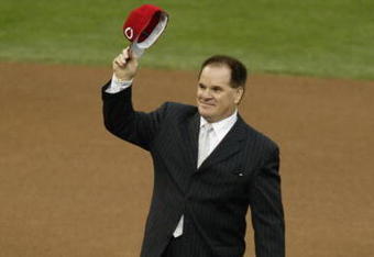 SAN FRANCISCO - OCTOBER 23:  Pete Rose acknowledges the crowd after he was voted number six in the MLB Ten Most Memorable Moments ceremony before the start of game four of the World Series between the San Francisco Giants and the Anaheim Angels on October 23, 2002 at Pacific Bell Park in San Francisco, California. Cal Ripken Jr. was voted number one.  The Giants won 4-3.  (Photo by Al Bello/Getty Images) 