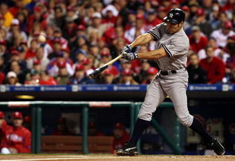 PHILADELPHIA - NOVEMBER 02:  Johnny Damon #18 of the New York Yankees hits a single in the top of the first inning against the Philadelphia Phillies in Game Five of the 2009 MLB World Series at Citizens Bank Park on November 2, 2009 in Philadelphia, Pennsylvania.  (Photo by Nick Laham/Getty Images)