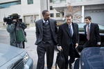 WASHINGTON -  JANUARY 15:  NBA player Gilbert Arenas (L) and his layer Kenneth L Wainstein (C) arrive at District of Columbia Court January 15, 2010 in Washington, DC.  The Washington Wizards star was to appear in court to answer to felony charges for bringing gun into the Wizards locker room.  (Photo by Brendan Smialowski/Getty Images)