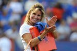 GAINESVILLE, FL - NOVEMBER 21: Shelley Meyer, wife of coach Urban Meyer of the Florida Gators, cheers a 63 - 3 victory against the Florida International University Golden Panthers, November 21, 2009 at Ben Hill Griffin Stadium in Gainesville, Florida.  (Photo by Al Messerschmidt/Getty Images)