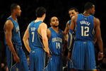 LOS ANGELES, CA - JANUARY 18:  (L-R) Rashard Lewis #9, J.J. Redick #7, Jameer Nelson #14, Matt Barnes #22 and Dwight Howard #12 of the Orlando Magic stand on the court in the fourth quarter against the Los Angeles Lakers during the game on January 18, 2010 at Staples Center in Los Angeles, California. NOTE TO USER: User expressly acknowledges and agrees that, by downloading and/or using this Photograph, user is consenting to the terms and conditions of the Getty Images License Agreement.  (Photo by Harry How/Getty Images)