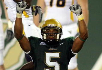 TAMPA, FL - SEPTEMBER 28:  Safety Nate Allen #5 of the University of South Florida Bulls celebrates his fumble recovery against the West Virginia Mountaineers at Raymond James Stadium September 28, 2007 in Tampa Florida.  (Photo by Marc Serota/Getty Images)