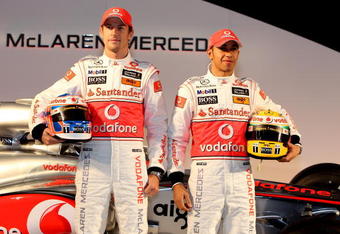 NEWBURY, ENGLAND - JANUARY 29:  Jenson Button and Lewis Hamilton of Great Britain and team Vodafone McLaren Mercedes at the unveiling of the new car for the 2010 Formula 1 season at the headquaters of Vodafone on January 29, 2010 in Newbury, England.  (Photo by Mark Thompson/Getty Images)