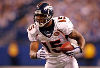 INDIANAPOLIS - DECEMBER 13:  Brandon Marshall #15 of the Denver Broncos runs with the ball during the NFL game against the Indianapolis Colts at Lucas Oil Stadium on December 13, 2009 in Indianapolis, Indiana.  The Colts won 28-16.  (Photo by Andy Lyons/Getty Images)