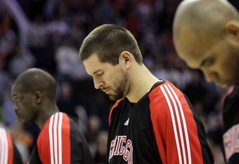 PHOENIX - JANUARY 22:  Brad Miller #52 of the Chicago Bulls stands attended for the National Anthem before the NBA game against the Phoenix Suns at US Airways Center on January 22, 2010 in Phoenix, Arizona. The Bulls defeated the Suns 115-104.  NOTE TO USER: User expressly acknowledges and agrees that, by downloading and or using this photograph, User is consenting to the terms and conditions of the Getty Images License Agreement.  (Photo by Christian Petersen/Getty Images)