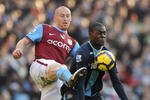 BIRMINGHAM, ENGLAND - JANUARY 17:  Frank Nouble of West Ham United battles with James Collins of Aston Villa during the Barclays Premier League Match between Aston Villa and West Ham United at Villa Park on January 17, 2010 in Birmingham, England.  (Photo by Laurence Griffiths/Getty Images)