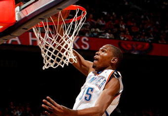ATLANTA - JANUARY 18:  Kevin Durant #35 of the Oklahoma City Thunder dunks against the Atlanta Hawks at Philips Arena on January 18, 2010 in Atlanta, Georgia.  NOTE TO USER: User expressly acknowledges and agrees that, by downloading and/or using this Photograph, User is consenting to the terms and conditions of the Getty Images License Agreement.  (Photo by Kevin C. Cox/Getty Images)