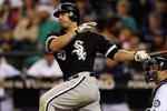 SEATTLE - AUGUST 12:  Carlos Quentin #20 of the Chicago White Sox bats during the game against the Seattle Mariners on August 12, 2009 at Safeco Field in Seattle, Washington. (Photo by Otto Greule Jr/Getty Images) 
