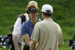 CROMWELL, CT - JULY 24:  Suzy Whaley shakes hands with Anthony Painter after the first round of the Greater Hartford Open on July 24, 2003 at TPC at River Highlands in Cromwell, Connecticut. (Photo by Elsa/Getty Images)