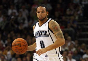 LONDON, ENGLAND - OCTOBER 06:  Deron Williams of the Utah Jazz in action during the NBA pre-season game as part of the 2009 NBA Europe Live Tour between Chicago Bulls and Utah Jazz at the O2 Arena on October 6, 2009 in London, England.  NOTE TO USER: User expressly acknowledges and agrees that, by downloading and/or using this Photograph, user is consenting to the terms and conditions of the Getty Images License Agreement.  (Photo by Bryn Lennon/Getty Images)