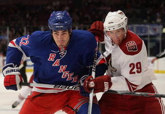 NEW YORK - OCTOBER 26: Brian Boyle #22 of the New York Rangers skates against Lauri Korpikoski #29 of the Phoenix Coyotes at Madison Square Garden on October 26, 2009 in New York, New York. (Photo by Bruce Bennett/Getty Images)