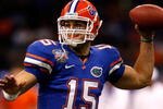 NEW ORLEANS - JANUARY 01:  Quarterback Tim Tebow #15 of the Florida Gators throws a pass against the Cincinnati Bearcats during the Allstate Sugar Bowl at the Louisana Superdome on January 1, 2010 in New Orleans, Louisiana.  (Photo by Matthew Stockman/Getty Images)