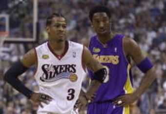 10 Jun 2001:  Allen Iverson #3 of the Philadelphia 76ers stands with Kobe Bryant #8 of the Los Angeles Lakers during game 3 of the NBA Finals at the First Union Center in Philadelphia, Pennsylvania.  DIGITAL IMAGE Mandatory Credit: Ezra Shaw/ALLSPORT. NOTE TO USER: It is expressly understood that the only rights Allsport are offering to license in this Photograph are one-time, non-exclusive editorial rights. No advertising or commercial uses of any kind may be made of Allsport photos.  User acknowledges that it is aware that Allsport is an editorial sports agency and that NO RELEASES OF ANY TYPE ARE OBTAINED from the subjects contained in the photographs.