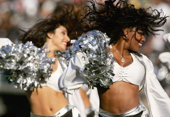 OAKLAND, CA - OCTOBER 29:  Oakland Raiderettes Cheerleaders perform on the field during an NFL game between the Oakland Raiders and the Pittsburgh Steelers at McAfee Coliseum on October 29, 2006 in Oakland, California. The Raiders won 20-13. (Photo by Robert Laberge/Getty Images)