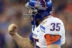 GLENDALE, AZ - JANUARY 04:  Kicker Kyle Brotzman #35 of the Boise State Broncos reacts after he passes the ball on a fake punt for 29-yards in the fourth quarter against the TCU Horned Frogs during the Tostitos Fiesta Bowl at the Universtity of Phoenix Stadium on January 4, 2010 in Glendale, Arizona.  (Photo by Jed Jacobsohn/Getty Images)