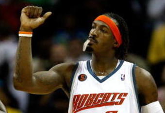 CHARLOTTE, NC - MARCH 31:  Gerald Wallace #3 and Raymond Felton #20 of the Charlotte Bobcats react after a play during their game against the Los Angeles Lakers at Time Warner Cable Arena on March 31, 2009 in Charlotte, North Carolina.  NOTE TO USER: User expressly acknowledges and agrees that, by downloading and/or using this Photograph, user is consenting to the terms and conditions of the Getty Images License Agreement.  (Photo by Streeter Lecka/Getty Images)