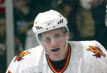 EAST RUTHERFORD, NJ - DECEMBER 7:  (L-R) Dion Phaneuf #3 and Jarome Iginla #12 of the Calgary Flames celebrate Phaneuf's goal at 28 seconds of the second period against the New Jersey Devils on December 7, 2005 at the Continental Airlines Arena in East Rutherford, New Jersey.  (Photo by Bruce Bennett/Getty Images)