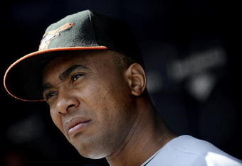 NEW YORK - SEPTEMBER 13:  Melvin Mora #6 of the Baltimore Orioles stands in the dugout in a game against the New York Yankees at Yankee Stadium on September 13, 2009 in the Bronx borough of New York City.  (Photo by Jeff Zelevansky/Getty Images)