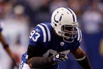 INDIANAPOLIS - NOVEMBER 16:  Dwight Freeney #93 of the Indianapolis Colts rushes against the Houston Texans during the game at Lucas Oil Stadium on November 17, 2008 in Indianapolis, Indiana.  (Photo by Harry How/Getty Images)