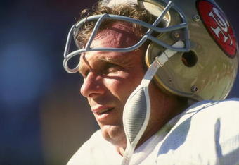 14 Oct 1990: A portrait of quarterback Joe Montana of the San Francisco 49ers as he stands on the sideline with his helmet off during a defensive series in the 49ers 45-35 victory over the Atlanta Falcons at Georgia Dome in Atlanta, Georgia.