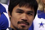 ARLINGTON, TX - JANUARY 19:  Manny Pacquiao poses for photos at Cowboys Stadium on January 19, 2010 in Arlington, Texas.  (Photo by Ronald Martinez/Getty Images)