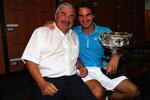 MELBOURNE, AUSTRALIA - JANUARY 31:  Roger Federer of Switzerland and his father Robert Federer pose with the Norman Brookes Challenge Cup in the players locker room after winning the men's final match against Andy Murray of Great Britain during day fourteen of the 2010 Australian Open at Melbourne Park on January 31, 2010 in Melbourne, Australia.  (Photo by Clive Brunskill/Getty Images)