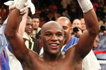 LAS VEGAS - SEPTEMBER 19:  Floyd Mayweather Jr. celebrates his unanimous-decision victory over Juan Manuel Marquez at the MGM Grand Garden Arena September 19, 2009 in Las Vegas, Nevada.  (Photo by Ethan Miller/Getty Images)
