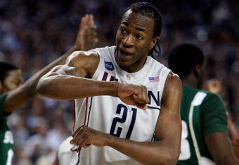 DETROIT - APRIL 04:  Stanley Robinson #21 of the Connecticut Huskies gestures in the second half against the Michigan State Spartans during the National Semifinal game of the NCAA Division I Men's Basketball Championship at Ford Field on April 4, 2009 in Detroit, Michigan.  (Photo by Gregory Shamus/Getty Images)