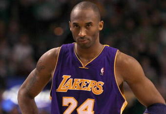 BOSTON - JANUARY 31:  Kobe Bryant  #24 the Los Angeles Lakers stands on the court during the closing minutes of a game  against the Boston Celtics at the TD Garden on January 31, 2010 in Boston, Massachusetts.  The Lakers won 90-89. NOTE TO USER: User expressly acknowledges and agrees that, by downloading and or using this photograph, User is consenting to the terms and conditions of the Getty Images License Agreement. (Photo by Jim Rogash /Getty Images)