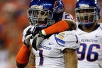 GLENDALE, AZ - JANUARY 04:  Kyle Wilson #1 of the Boise State Broncos reacts after sacking quarterback Andy Dalton #14 of the TCU Horned Frogs for a 10-yard loss in the first quarter during the Tostitos Fiesta Bowl at the Universtity of Phoenix Stadium on January 4, 2010 in Glendale, Arizona.  (Photo by Jamie Squire/Getty Images)