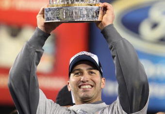 NEW YORK - NOVEMBER 04:  Andy Pettitte #46 of the New York Yankees celebrates with the trophy after their 7-3 win against the Philadelphia Phillies in Game Six of the 2009 MLB World Series at Yankee Stadium on November 4, 2009 in the Bronx borough of New York City.  (Photo by Jed Jacobsohn/Getty Images)