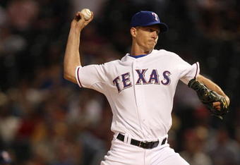 ARLINGTON, TX - APRIL 15:  Pitcher Kris Benson of the Texas Rangers throws against the Baltimore Orioles while wearing jersey #42 to commemorate Jackie Robinson day on April 15, 2009 at Rangers Ballpark in Arlington, Texas.  (Photo by Ronald Martinez/Getty Images)