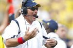 ANN ARBOR, MI - SEPTEMBER 05:  Head coach Rich Rodriguez yells for the sideline while playing the Western Michigan Broncos vs. Michigan Wolverines on September 5, 2009 at Michigan Stadium in Ann Arbor, Michigan.  (Photo by Gregory Shamus/Getty Images)
