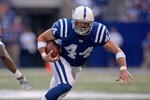 INDIANAPOLIS - NOVEMBER 8:  Dallas Clark #44 of the Indianapolis Colts runs with the ball during the NFL game against the Houston Texans at Lucas Oil Stadium on November 8, 2009 in Indianapolis, Indiana.  The Colts defeated the Texans 20-17.  (Photo by Andy Lyons/Getty Images)