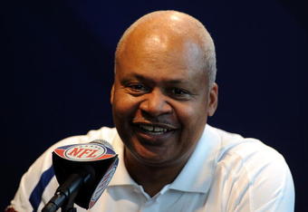 MIAMI GARDENS, FL - FEBRUARY 02:  Head coach Jim Caldwell of the Indianapolis Colts speaks to members of the media with a Haitian flag on his head during Super Bowl XLIV Media Day at Sun Life Stadium on February 2, 2010 in Miami Gardens, Florida.  (Photo by Michael Heiman/Getty Images)