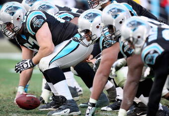CHARLOTTE, NC - JANUARY 03:  Center Ryan Kalil #67 of the Carolina Panthers leads the offensive line during the game against the New Orleans Saints at Bank of America Stadium on January 3, 2010 in Charlotte, North Carolina.  (Photo by Streeter Lecka/Getty Images)