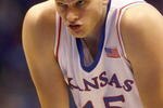 LAWRENCE, KS - DECEMBER 19:  Cole Aldrich #45 of the Kansas Jayhawks gets ready on court during the game against the Michigan Wolverines on December 19, 2009 at Allen Fieldhouse in Lawrence, Kansas. (Photo by Jamie Squire/Getty Images)