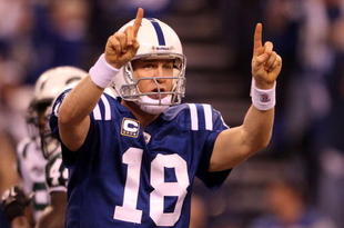 INDIANAPOLIS - JANUARY 24:  Quarterback Peyton Manning #18 of the Indianapolis Colts reacts during the first half against the New York Jets during the AFC Championship Game at Lucas Oil Stadium on January 24, 2010 in Indianapolis, Indiana. The Colts defeated the Jets 30-17.  (Photo by Elsa/Getty Images)