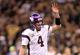 NEW ORLEANS - JANUARY 24:  Quarterback Brett Favre #4 of the Minnesota Vikings waves on the field against the New Orleans Saints during the NFC Championship Game at the Louisiana Superdome on January 24, 2010 in New Orleans, Louisiana. The Saints won 31-28 in overtime. (Photo by Ronald Martinez/Getty Images)