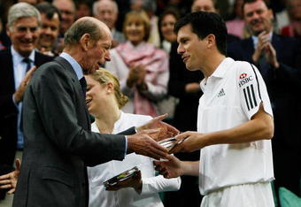LONDON, ENGLAND - MAY 17:  Tim Henman receives a  commemorative trophy from HRH The Duke of Kent following the 'Centre Court Celebration' at Wimbledon on May 17, 2009 in London, England.  (Photo by Paul Gilham/Getty Images)