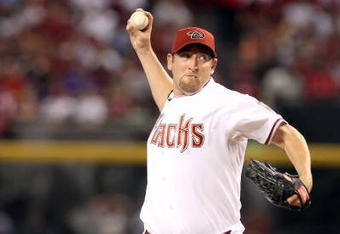 PHOENIX - APRIL 06:  Starting pitcher Brandon Webb #17 of the Arizona Diamondbacks pitches against the Colorado Rockies during the MLB openning day game at Chase Field on April 6, 2009 in Phoenix, Arizona.  The Diamondbacks defeated the Rockies 9-8.  (Photo by Christian Petersen/Getty Images)