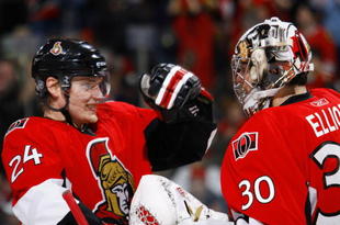 OTTAWA, ON - JANUARY 19:  Anton Volchenkov #24 of the Ottawa Senators celebrates with teammate Brian Elliott #30 after a 4-1 victory over the Chicago Blackhawks in a game at Scotiabank Place on January 19, 2010 in Ottawa, Canada.  (Photo by Phillip MacCallum/Getty Images)