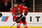CHICAGO - JANUARY 10: Partick Sharp #10 of the Chicago Blackhawks looks to pass the puck against the Anaheim Ducks at the United Center on January 10, 2010 in Chicago, Illinois. The Ducks defeated the Blackhawks 3-1. (Photo by Jonathan Daniel/Getty Images)