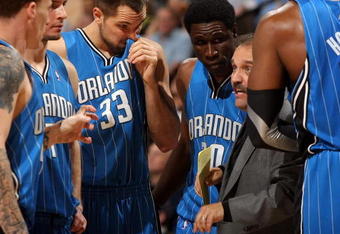 DENVER - JANUARY 13:  Head coach Stan Van Gundy of the Orlando Magic leads his team against the Denver Nuggets during NBA action at Pepsi Center on January 13, 2010 in Denver, Colorado. The Nuggets defeated the Magic 115-97. NOTE TO USER: User expressly acknowledges and agrees that, by downloading and/or using this Photograph, user is consenting to the terms and conditions of the Getty Images License Agreement.  (Photo by Doug Pensinger/Getty Images)