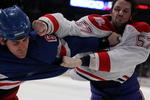 NEW YORK - JANUARY 17:  Wade Redden #6 of the New York Rangers fights Benoit Pouliot #57 of the Montreal Canadiens during their game on January 17, 2010 at Madison Square Garden in New York City, New York.  (Photo by Al Bello/Getty Images)